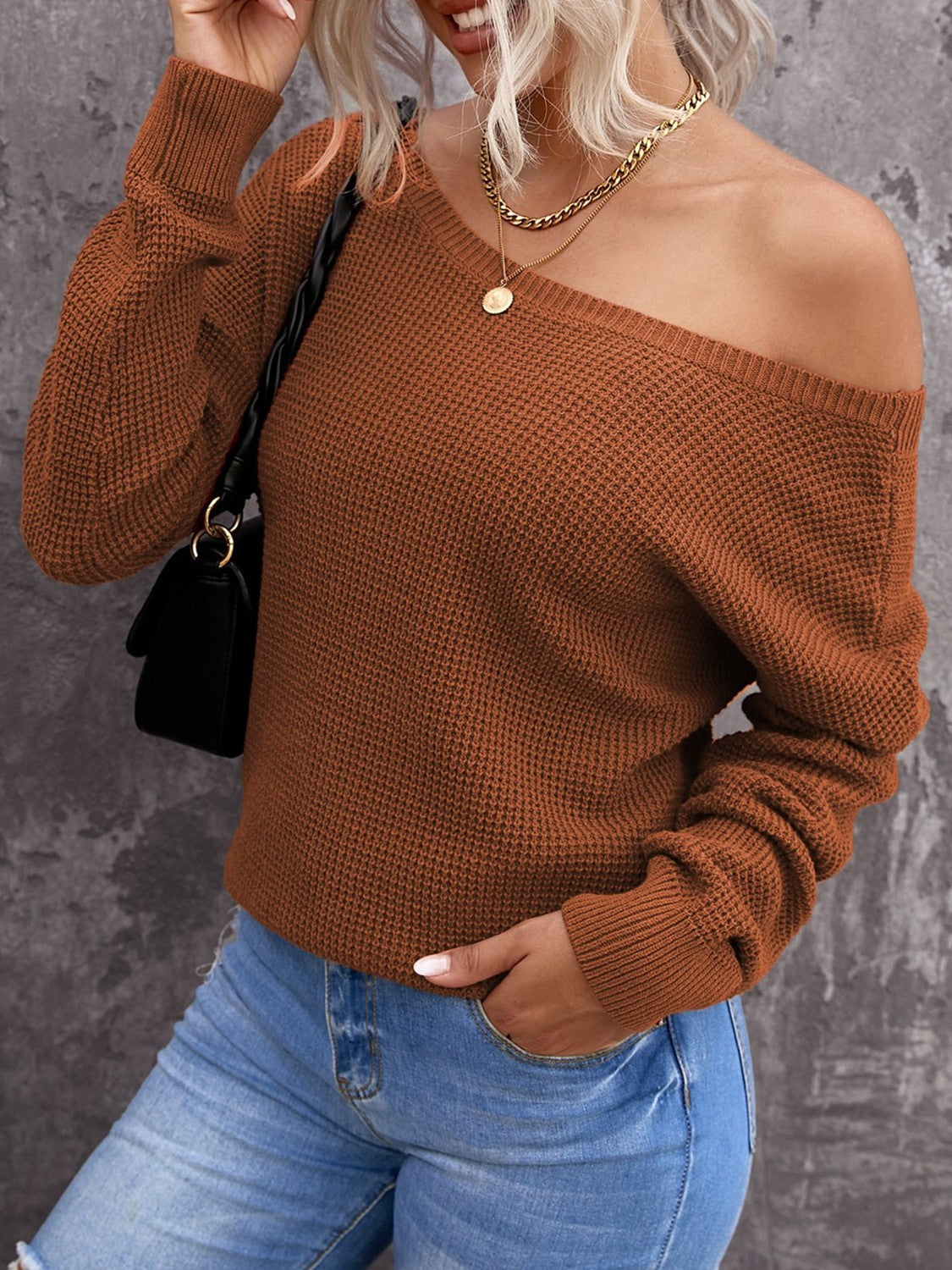 Pull au design réfléchi
