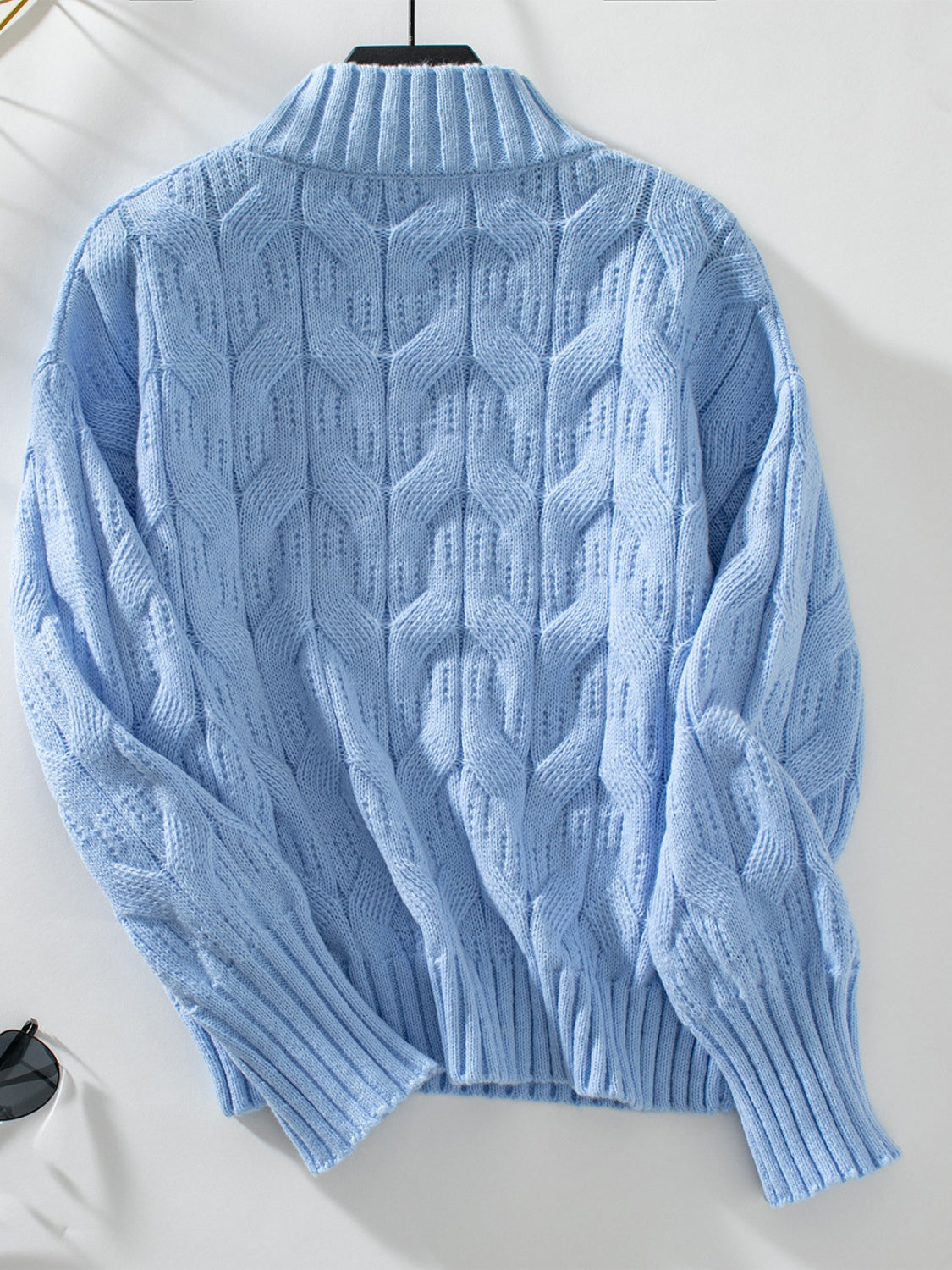 Pull au design réfléchi