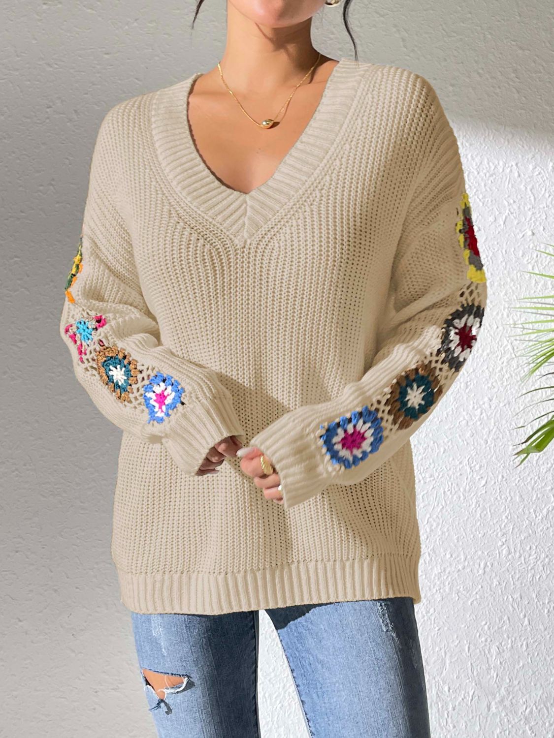 Pull au design réfléchi