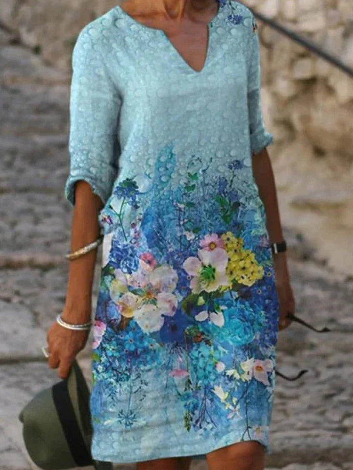 SL | Robe midi imprimée avec décolleté en V