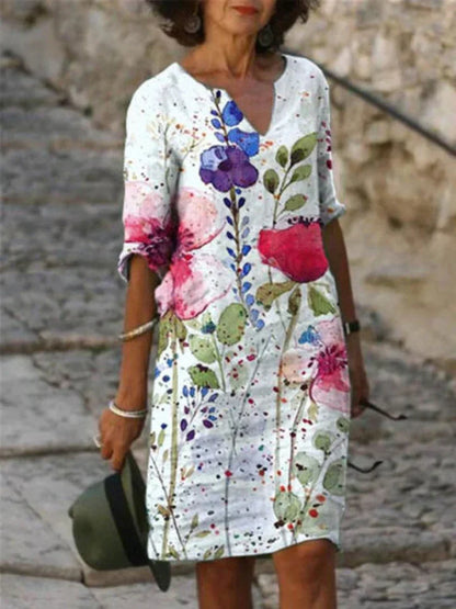 SL | Robe midi imprimée avec décolleté en V