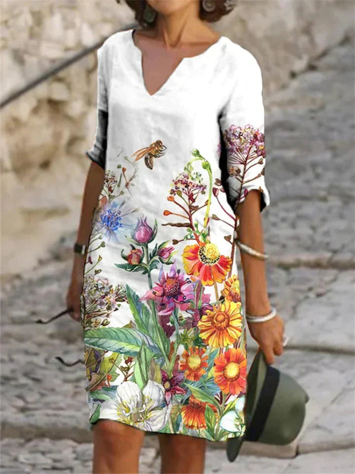 SL | Robe midi imprimée avec décolleté en V