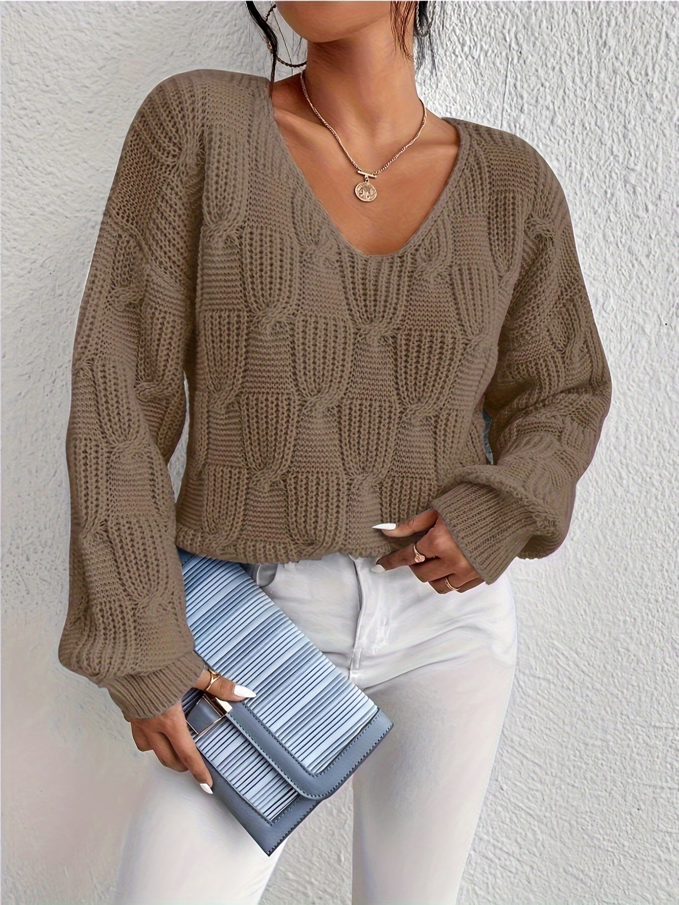 Pull au design réfléchi