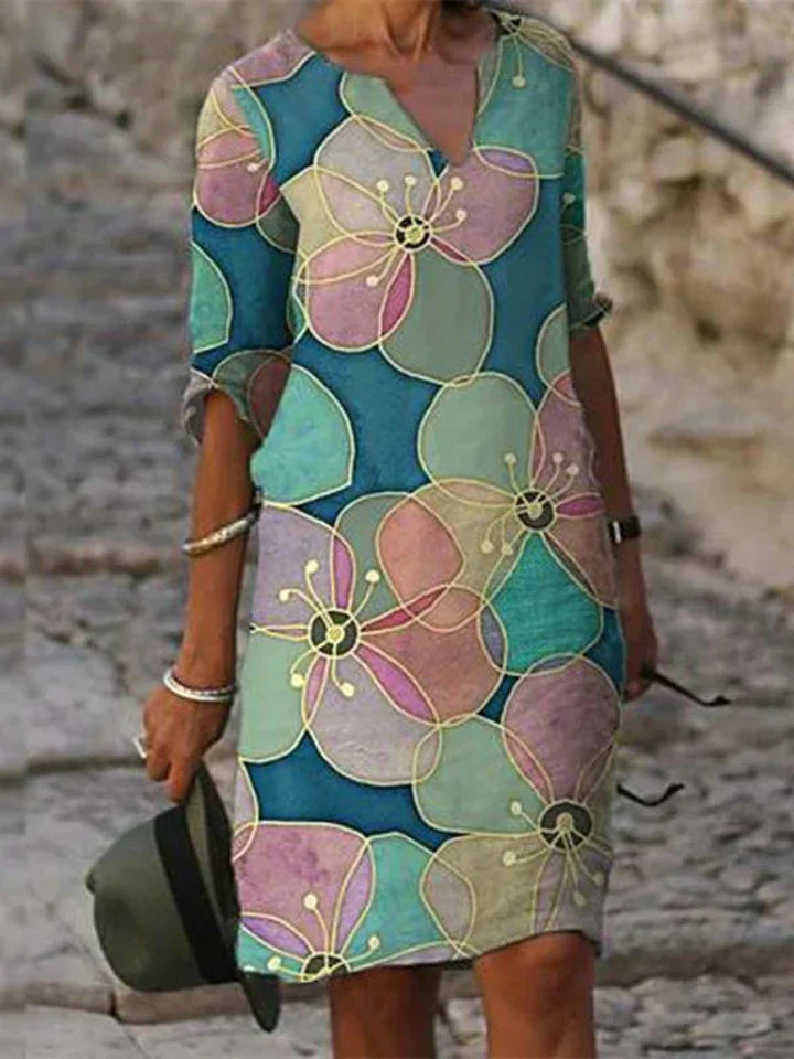 SL | Robe midi imprimée avec décolleté en V