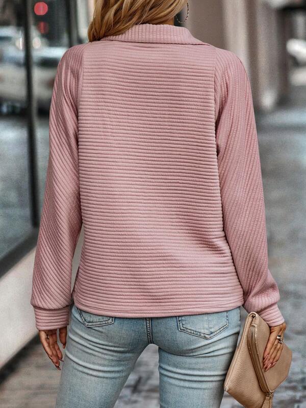 Pull au design réfléchi