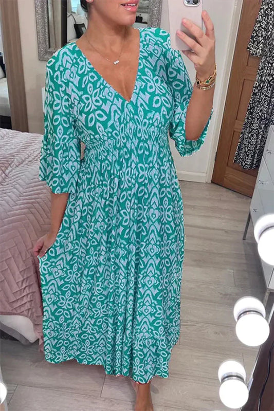 SL | Robe décontractée à fleurs et décolleté en V