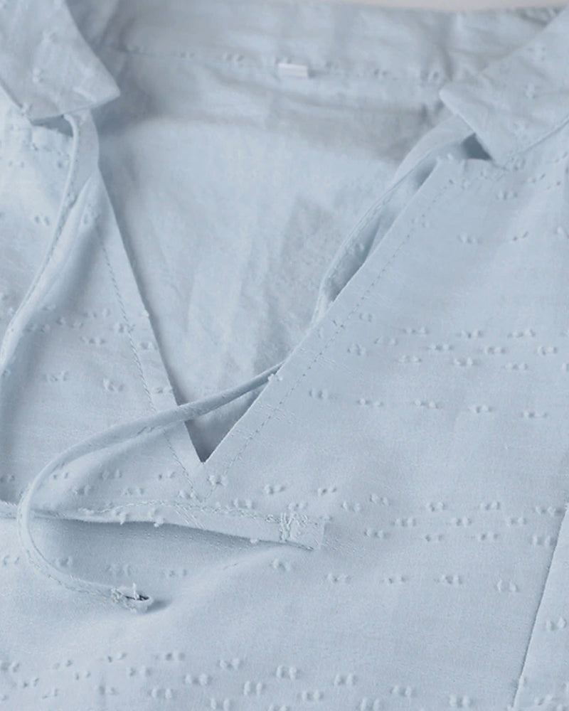 SL | Mini-robe en ligne A avec décolleté en V, manches 3/4 et poches