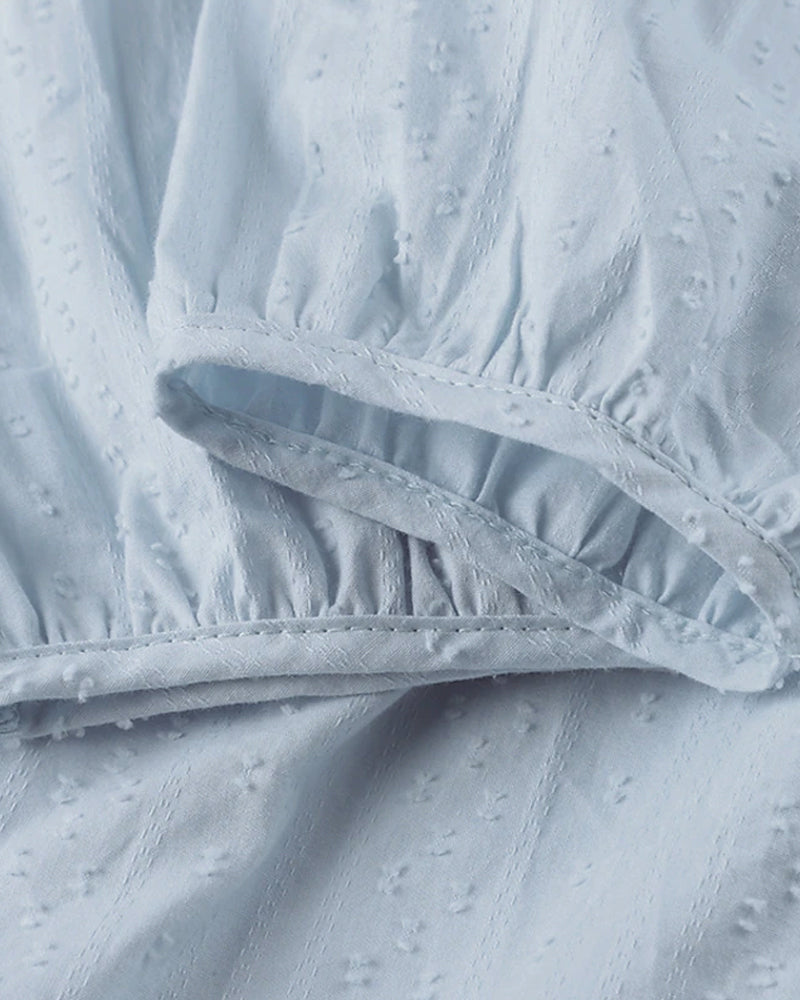 SL | Mini-robe en ligne A avec décolleté en V, manches 3/4 et poches