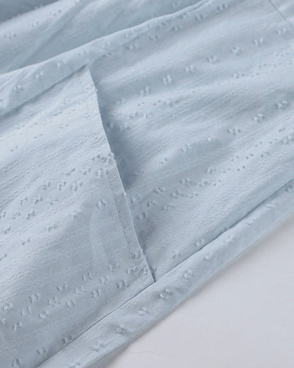 SL | Mini-robe en ligne A avec décolleté en V, manches 3/4 et poches