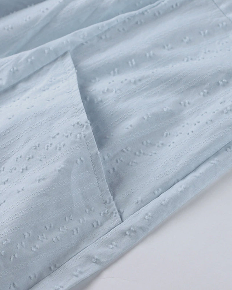 SL | Mini-robe en ligne A avec décolleté en V, manches 3/4 et poches