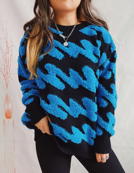Pull au design réfléchi