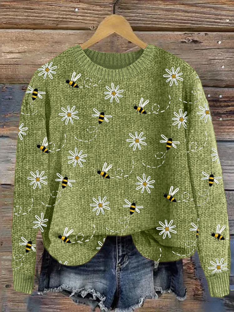 Pull en tricot avec broderie de marguerites et d'abeilles
