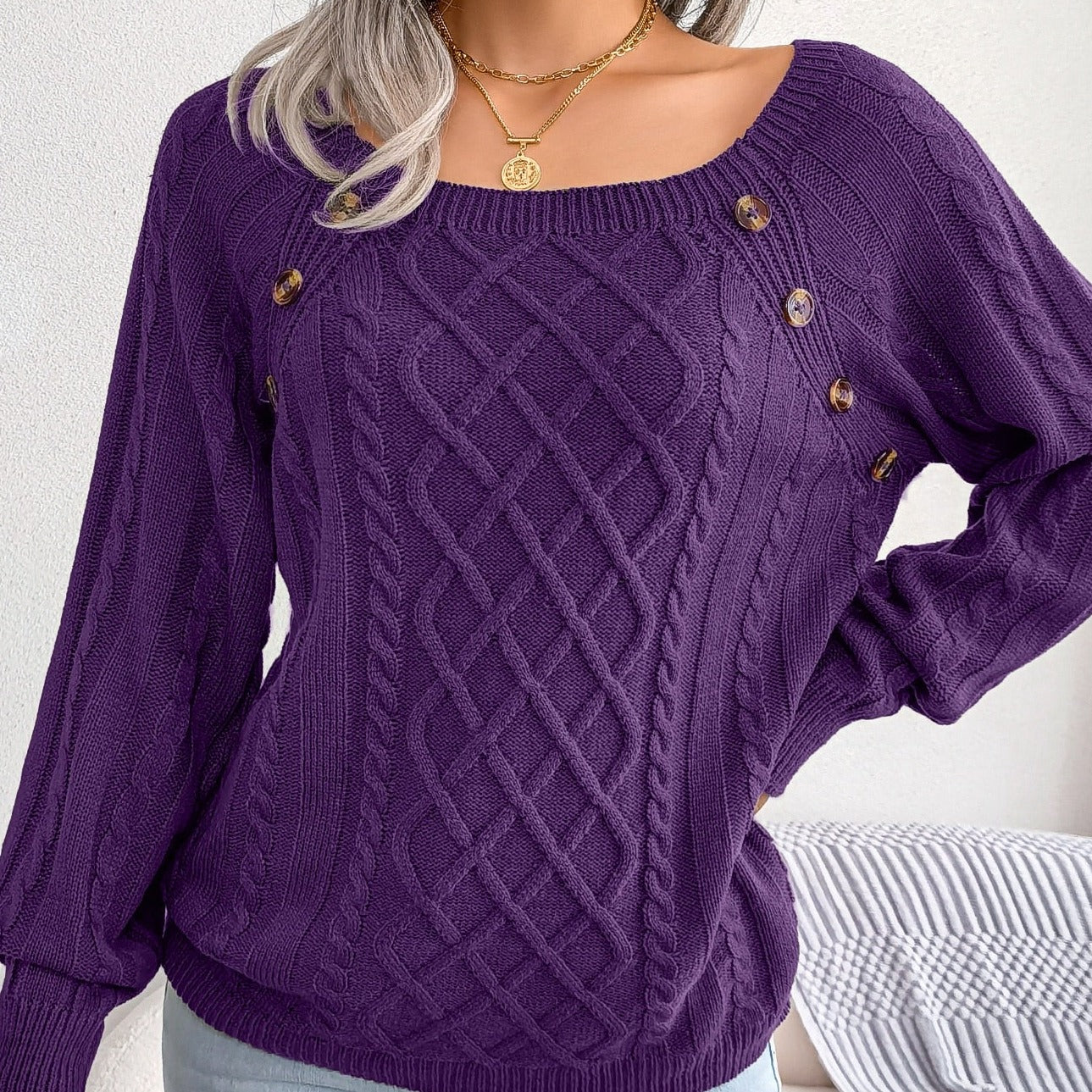 Pull au design réfléchi