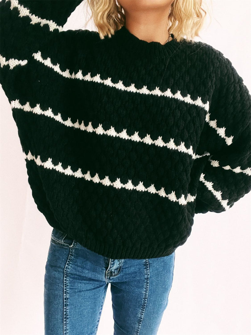 Pull au design réfléchi