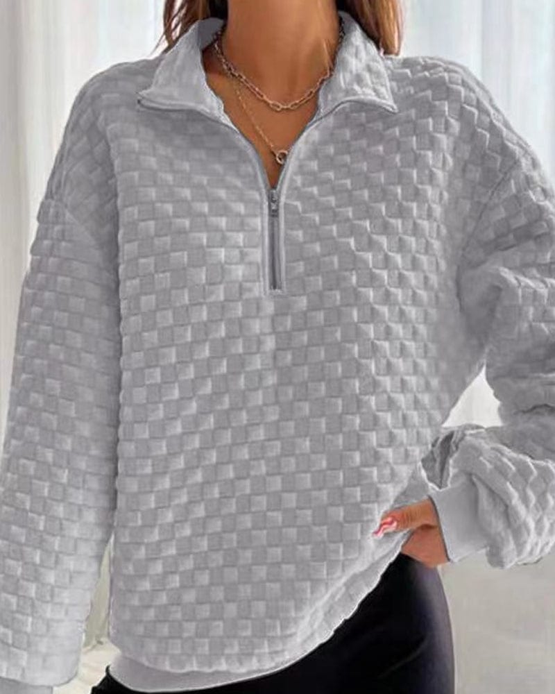 Pull au design réfléchi
