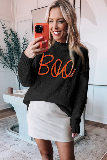Pull au design réfléchi