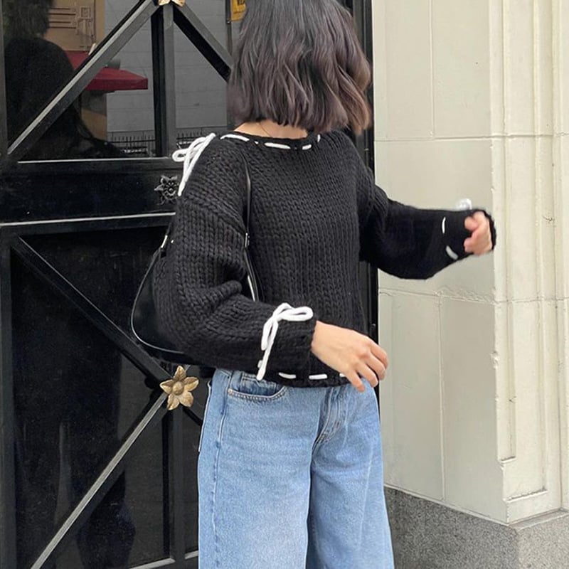 Pull au design réfléchi