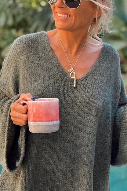 Pull au design réfléchi