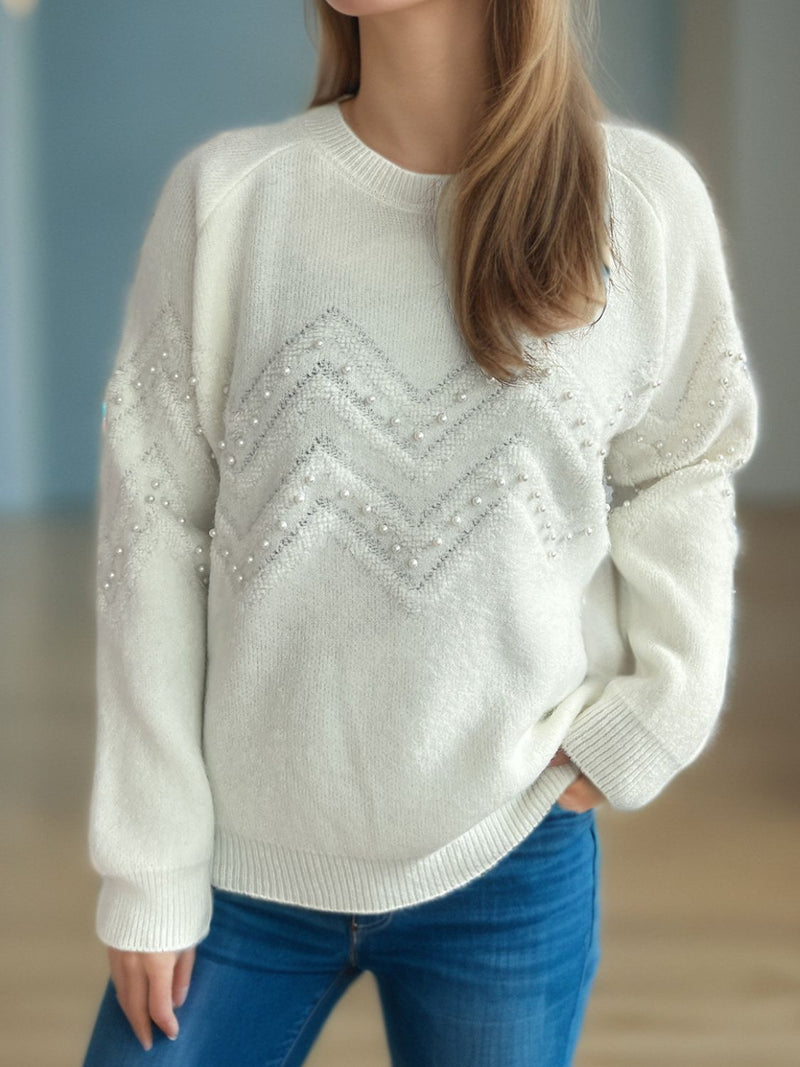 Pull au design réfléchi