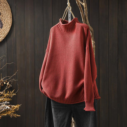 Pull au design réfléchi