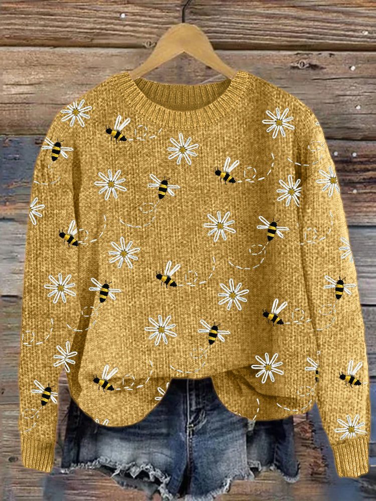 Pull en tricot avec broderie de marguerites et d'abeilles
