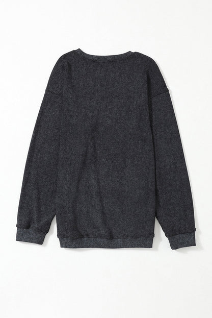 Pull au design réfléchi
