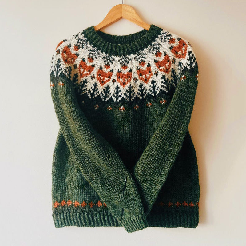 Pull au design réfléchi