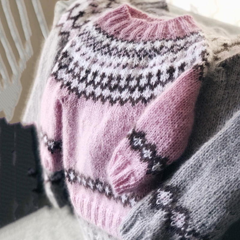 Pull au design réfléchi