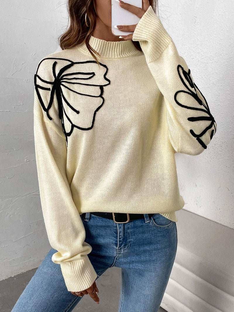 Pull au design réfléchi