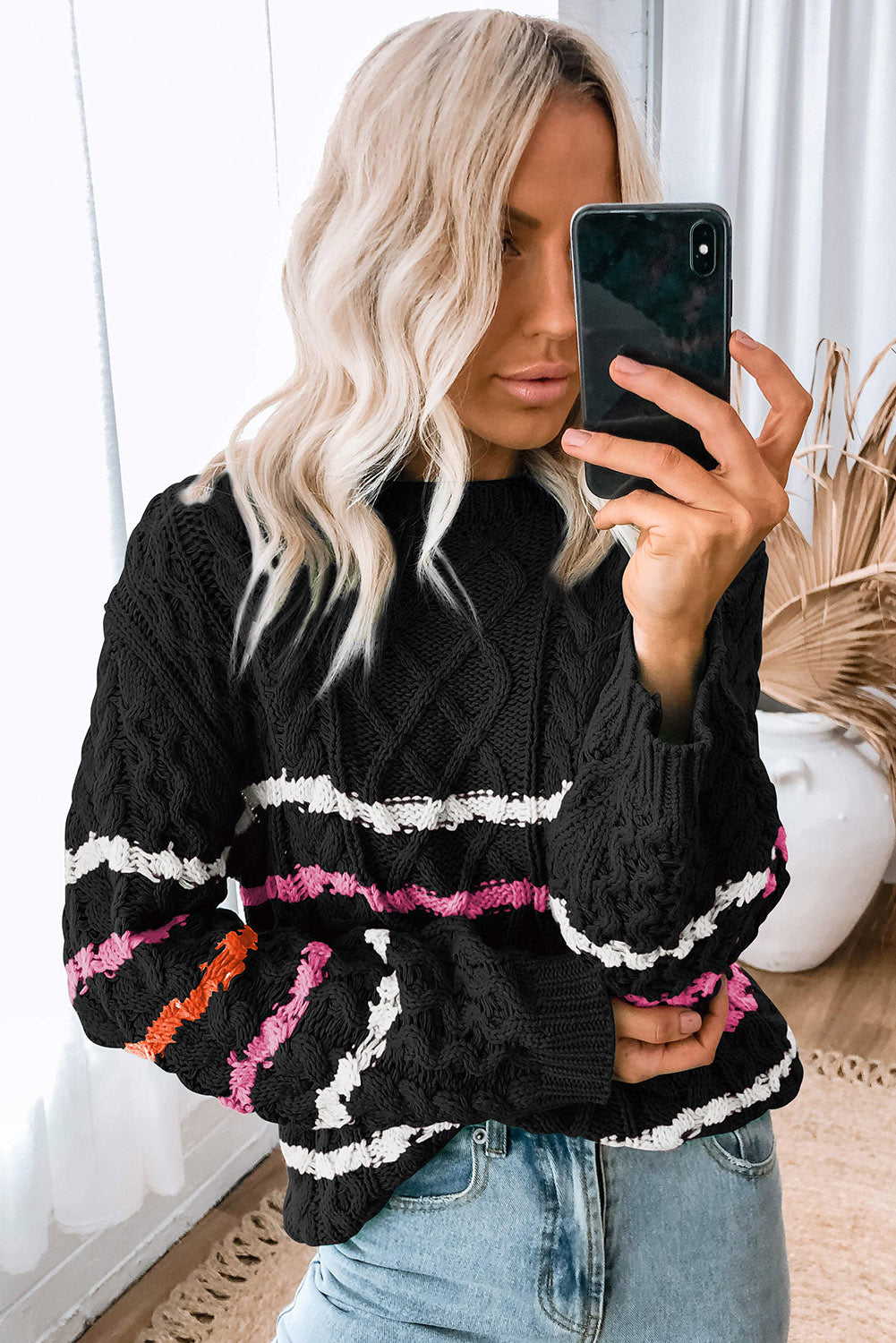 Pull au design réfléchi