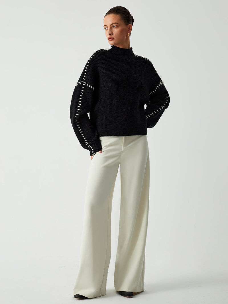 Pull au design réfléchi