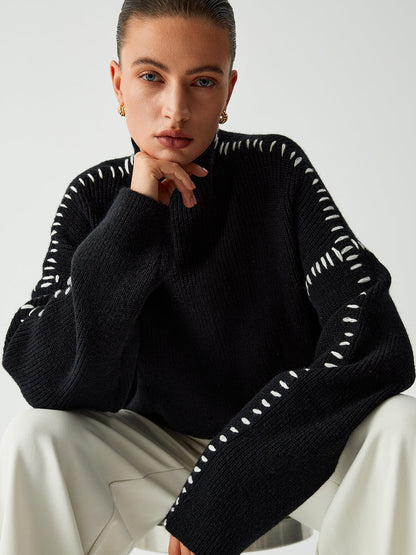 Pull au design réfléchi