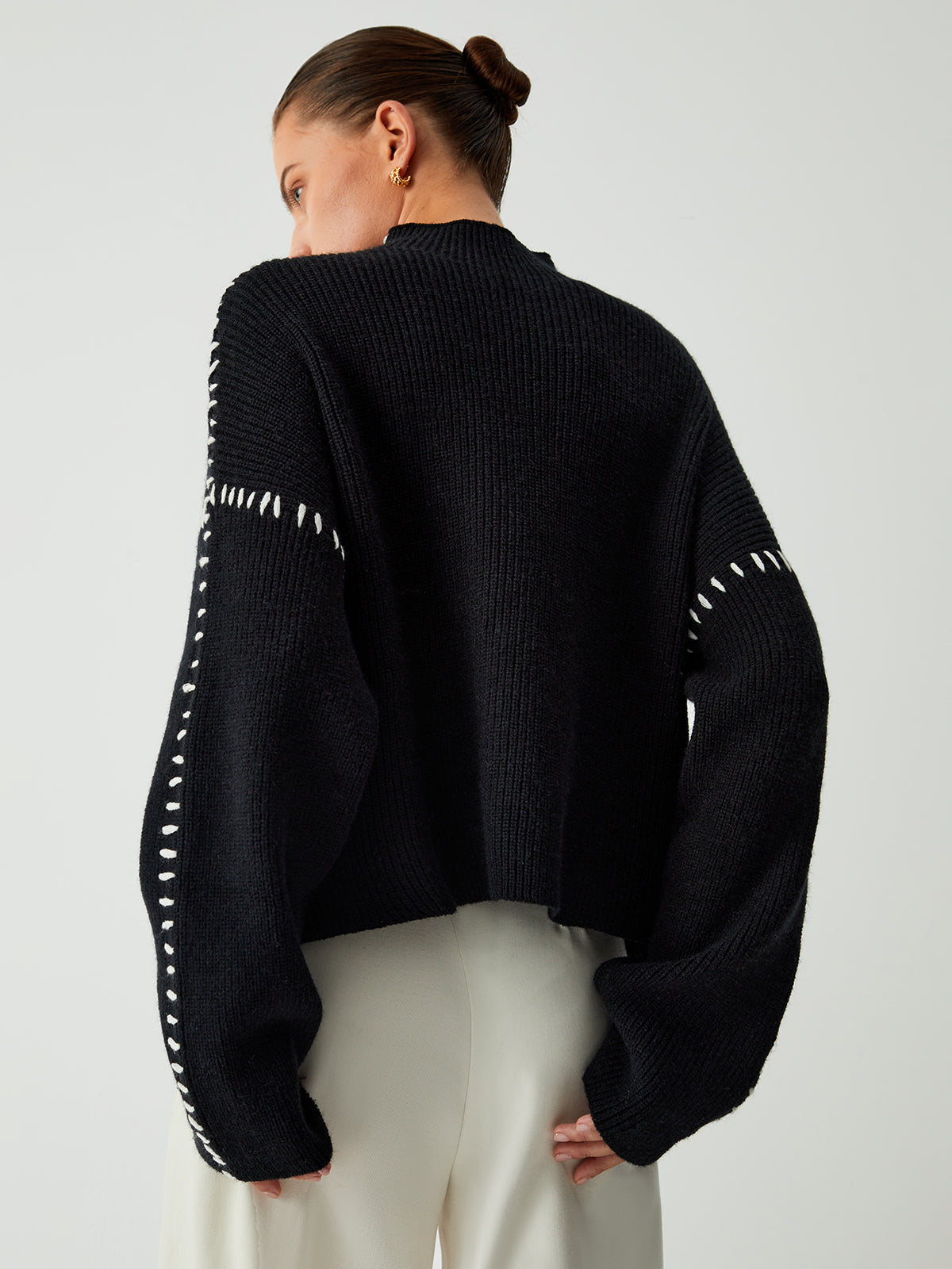 Pull au design réfléchi