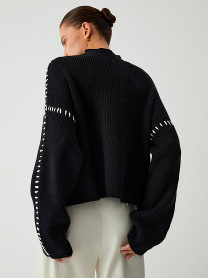 Pull au design réfléchi