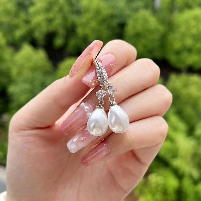 Perle Boucle d'oreille classique au charme intemporel