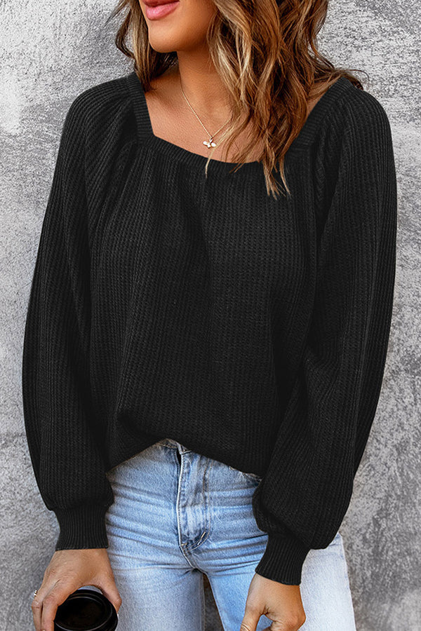 Pull au design réfléchi