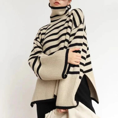 Pull à col roulé en coton à rayures diagonales marquées et ourlet asymétrique