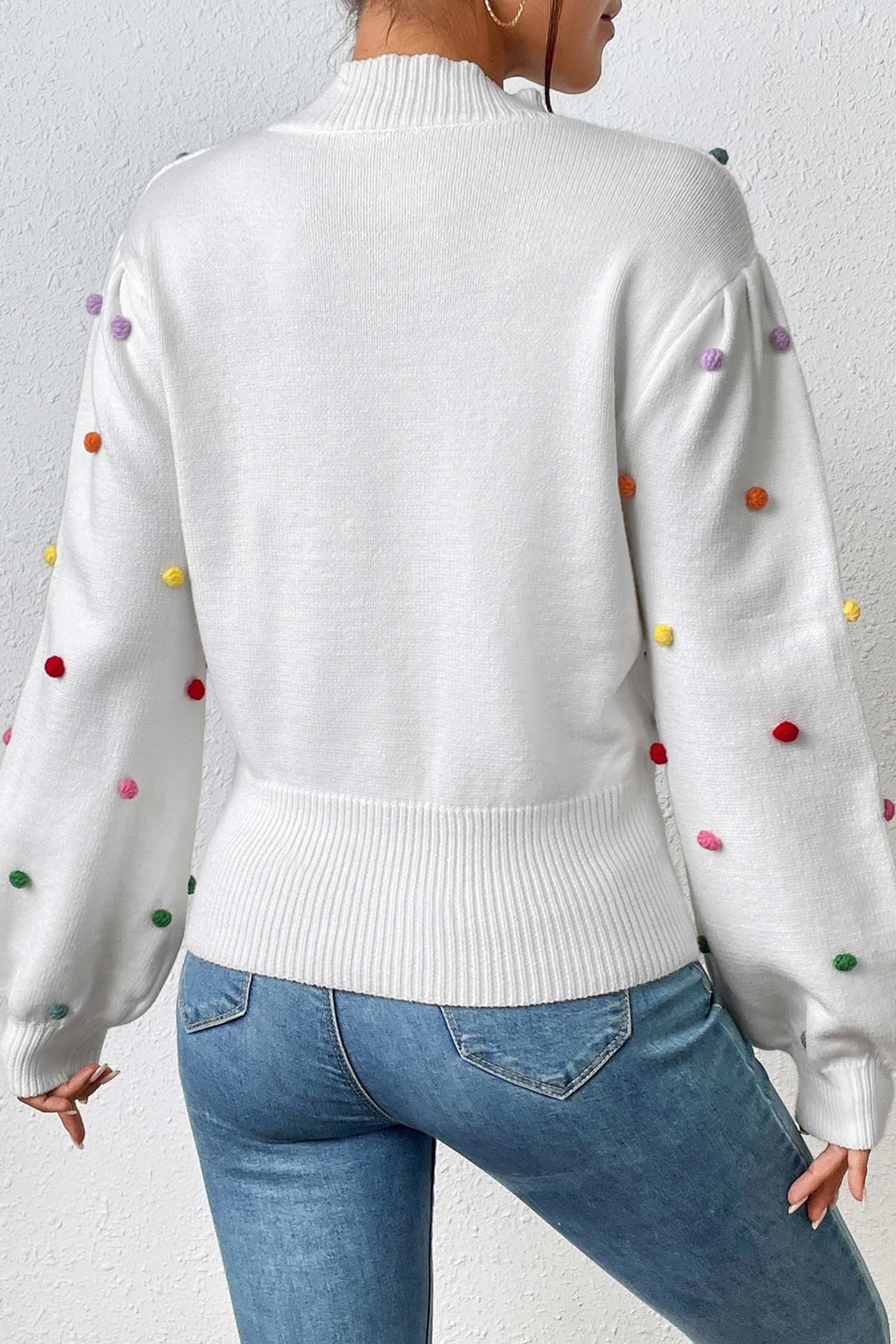 Pull au design réfléchi