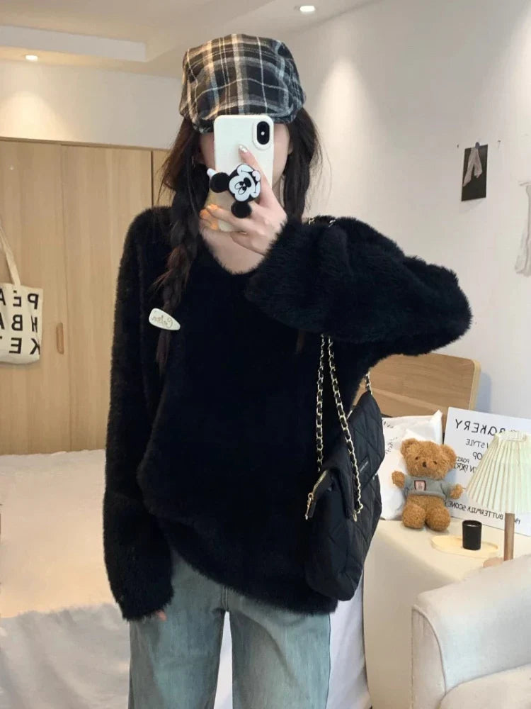 Pull au design réfléchi