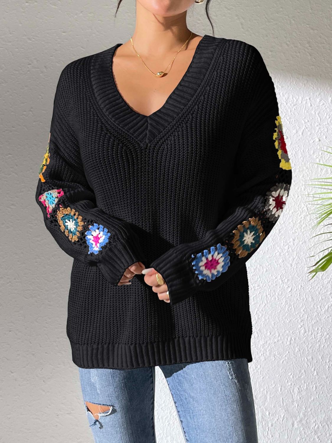 Pull au design réfléchi