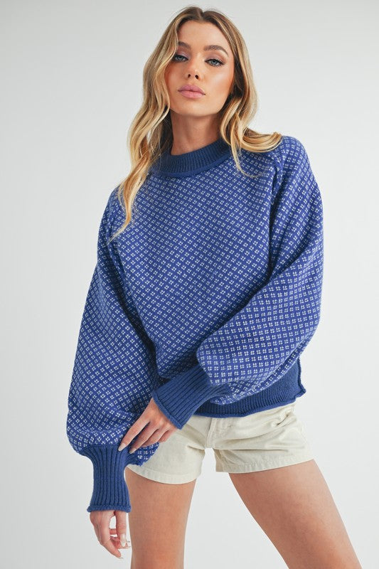 Pull au design réfléchi