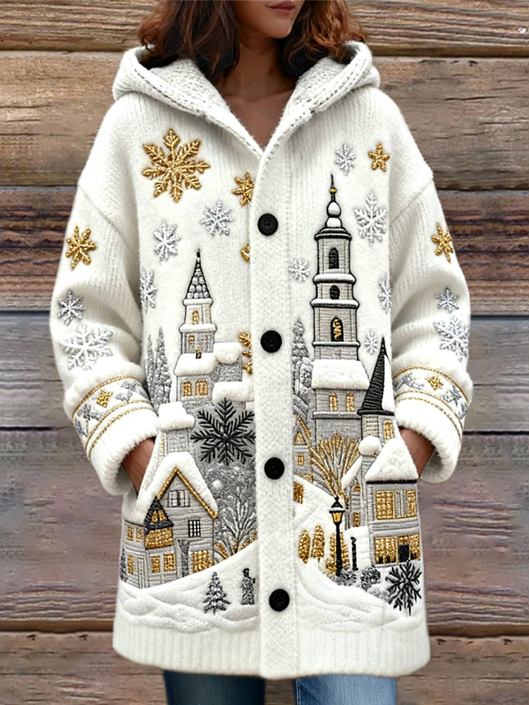 Cardigan en laine avec maisons de village et flocons de neige dorés