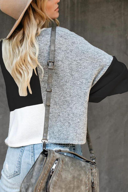 Pull au design réfléchi