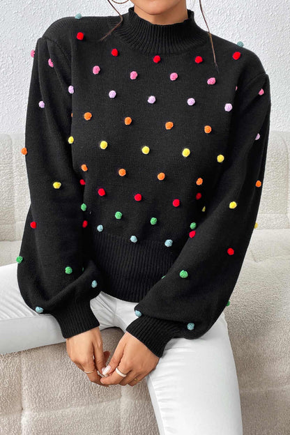 Pull au design réfléchi