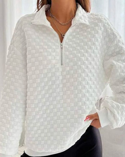 Pull au design réfléchi