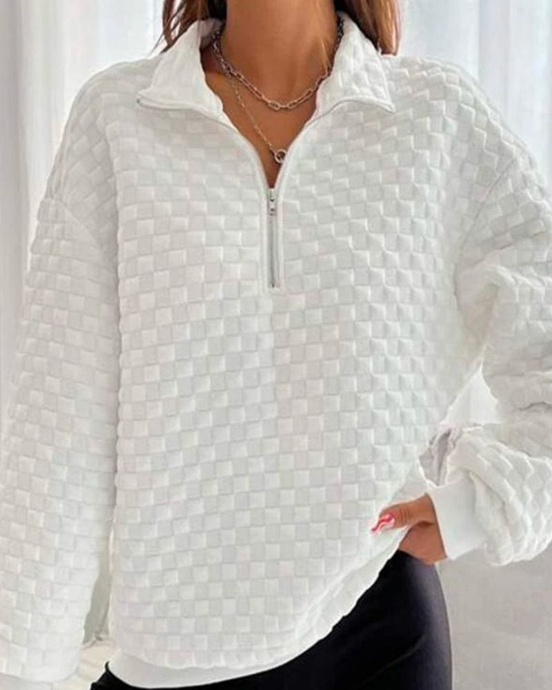 Pull au design réfléchi