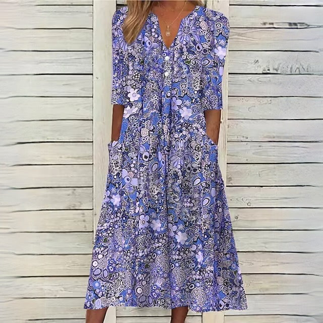 SL | robe florale avec décolleté en V et poches latérales