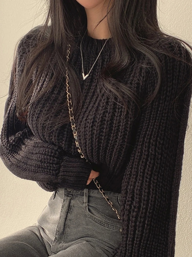 Pull au design réfléchi
