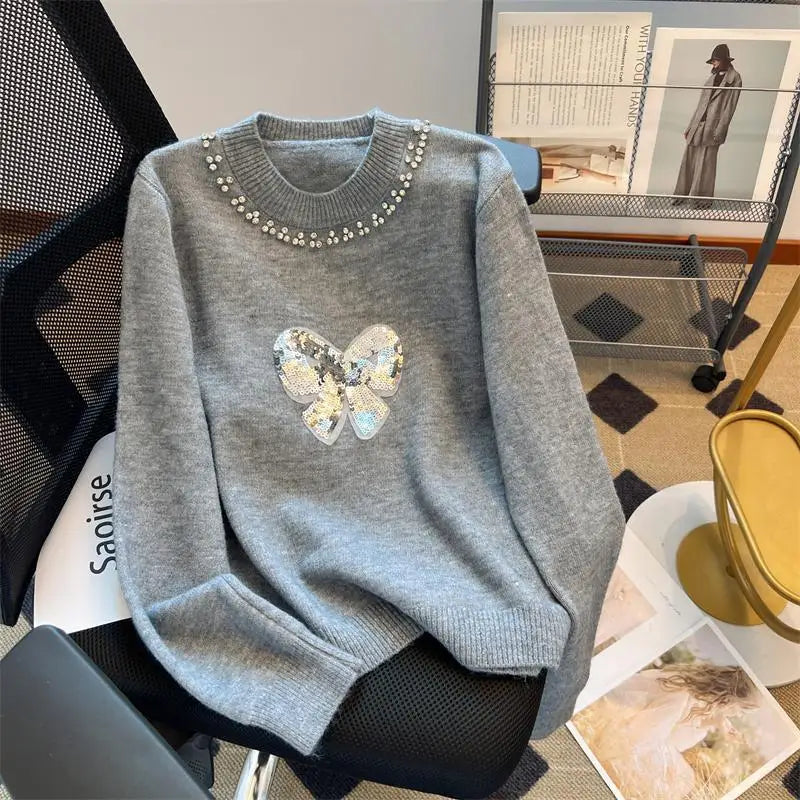 Pull au design réfléchi