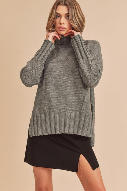 Pull au design réfléchi